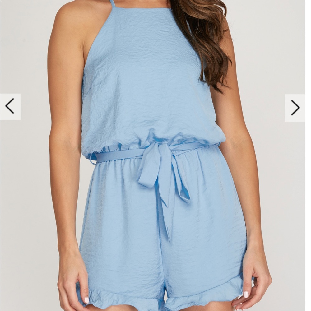 She + sky romper in Carolina blue sizes small- large left
